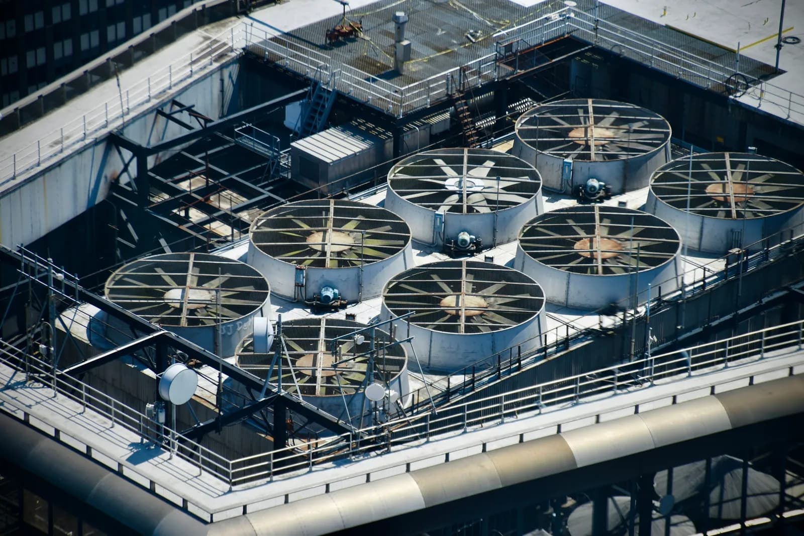 Commercial rooftop cooling towers on a large building